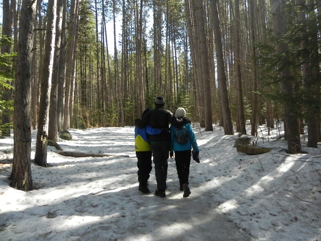 Family hiking in The Pines