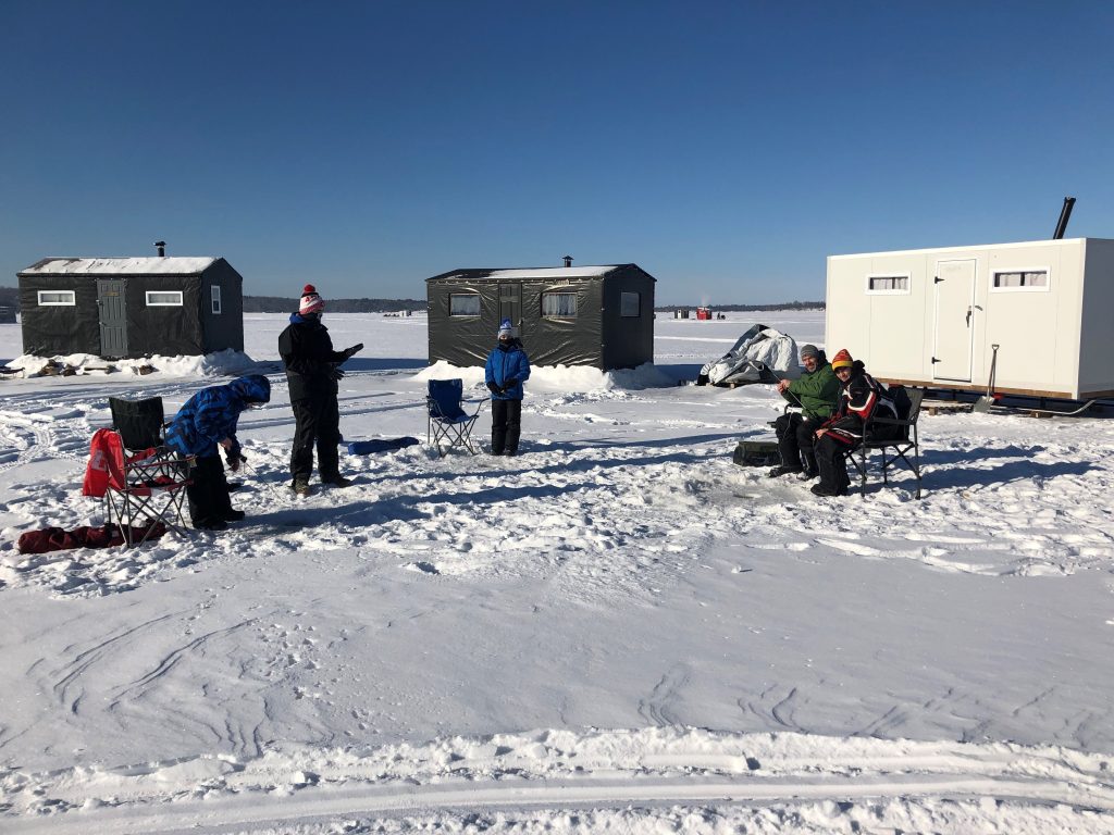 Family ice fishing on Lake Nipissing