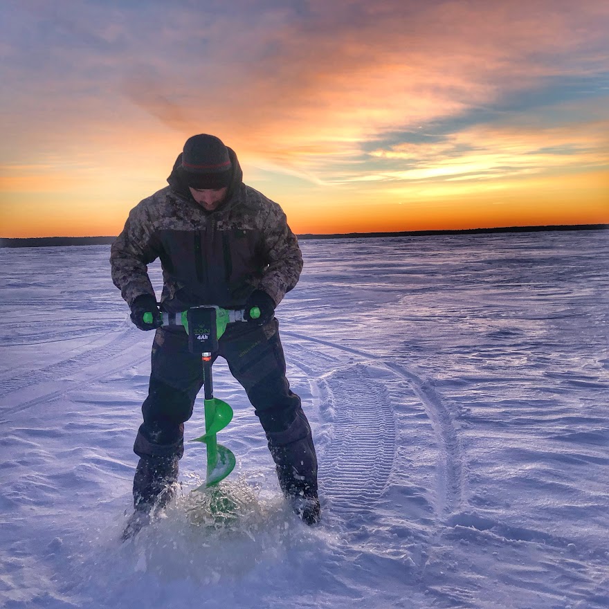 Using the auger to go ice fishing on Lake Nipissing